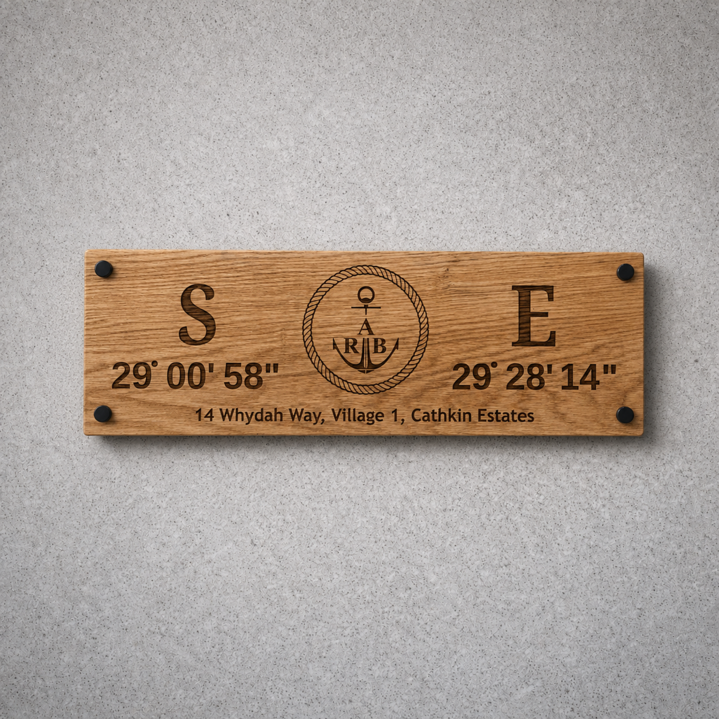 Personalised oak coordinates sign with custom engraving and black wall standoffs