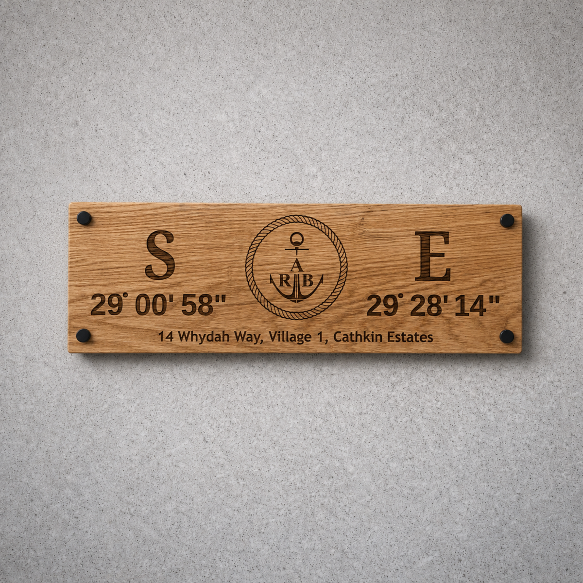 Personalised oak coordinates sign with custom engraving and black wall standoffs