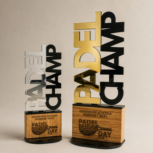 Personalised Padel CHAMP trophies in mirror gold and silver with engraved wooden bases